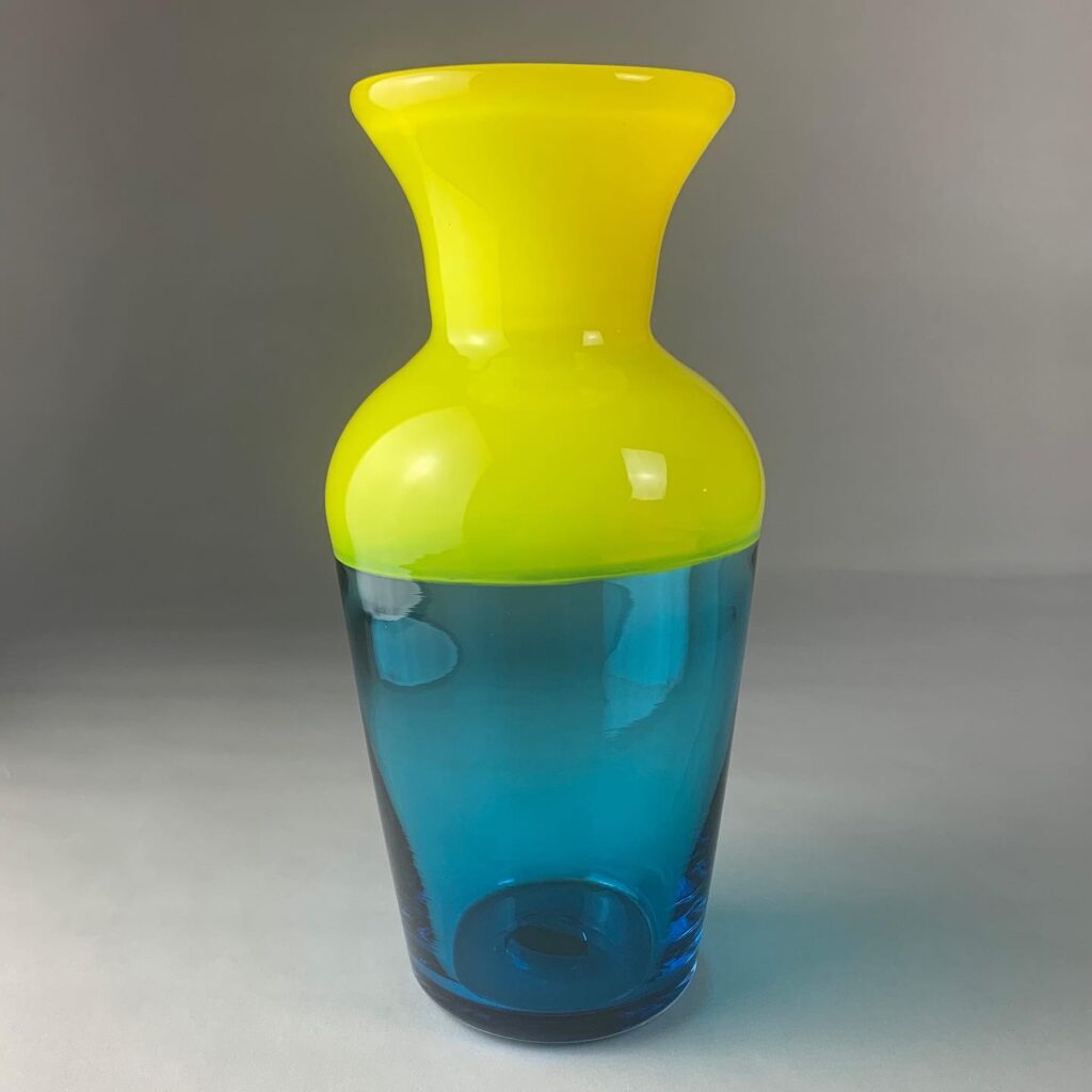 A vase with two colors of blue and yellow.