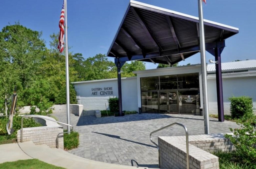 A building with an american flag on top of it.