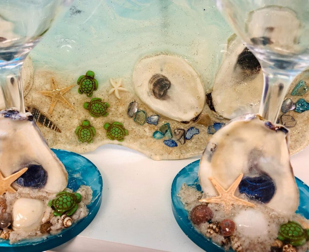 A close up of two bowls with shells on them